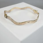 Gouden Christian slavenarmband golvend model
