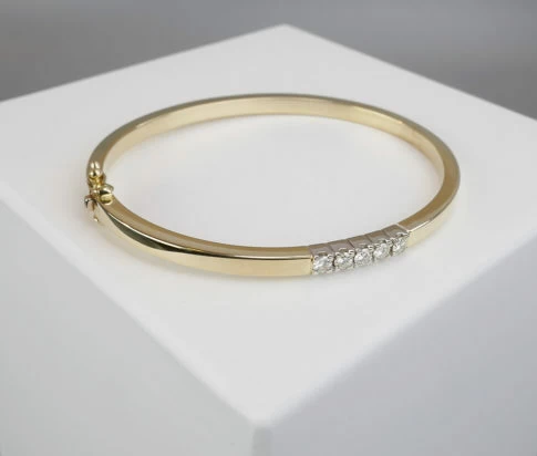 Gouden Christian slavenarmband met diamanten