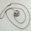 Gouden collier met diamanten harten hanger