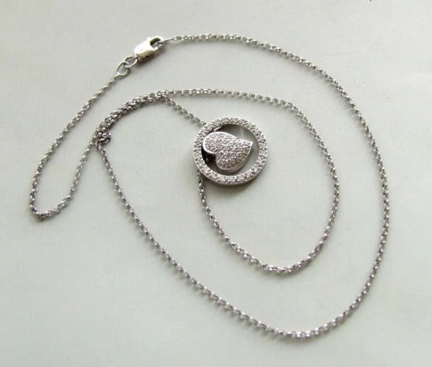 Gouden collier met diamanten harten hanger