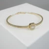Gouden fantasie armband met zirkonia