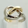 Gouden gevlochten bicolor ring