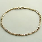 Gouden schakelarmband bicolor Gouden schakelarmband bicolor
