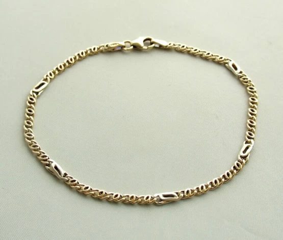 Gouden schakelarmband bicolor Gouden schakelarmband bicolor