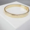 Christian slavenarmband 14 karaat goud