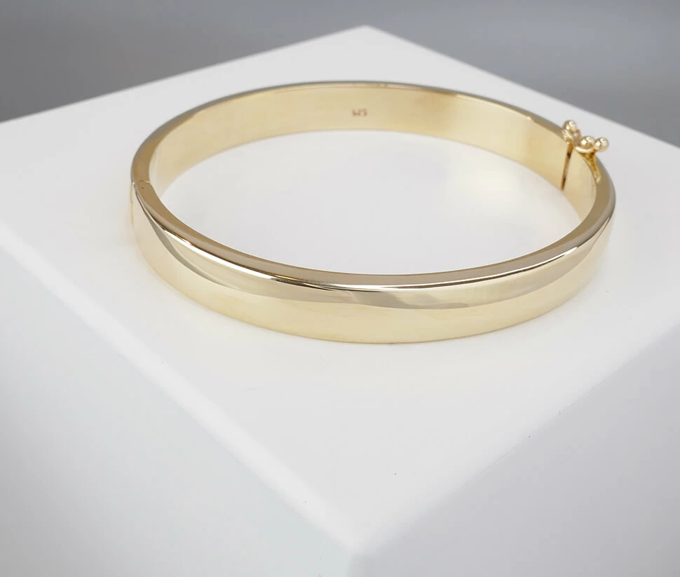 Christian slavenarmband 14 karaat goud