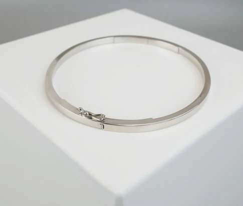 Christian wit goud slavenarmband
