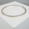 Christian wit goud slavenarmband