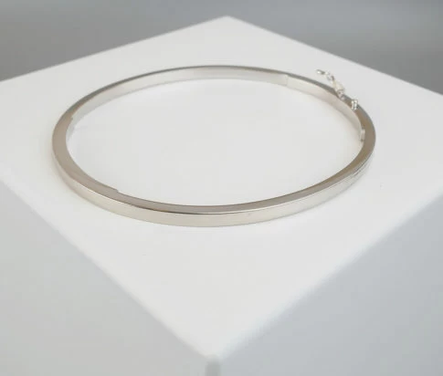 Christian wit goud slavenarmband