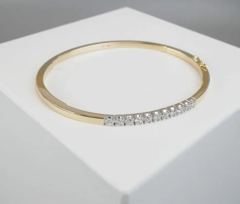 Goud Christian slavenarmband met diamanten