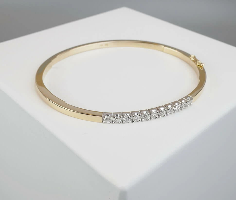 Goud Christian slavenarmband met diamanten