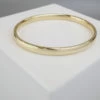 Goud op zilver slavenarmband