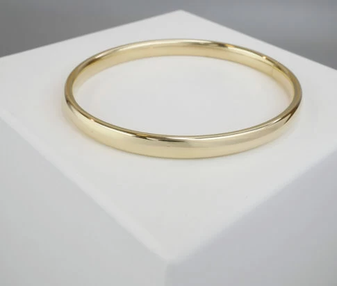 Goud op zilver slavenarmband