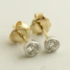 Gouden bicolor diamanten oorstekers