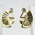 Gouden fantasie oorbellen met diamant Gouden fantasie oorbellen met diamant