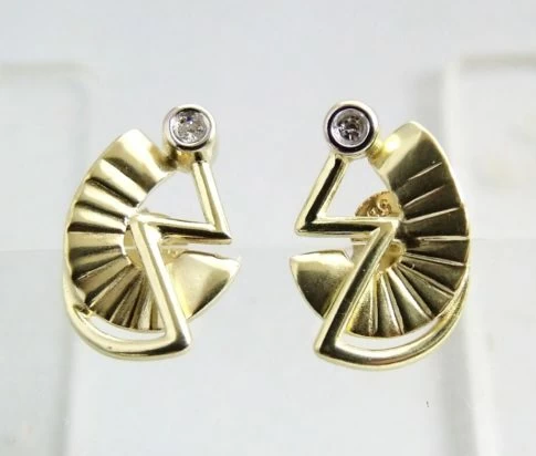 Gouden fantasie oorbellen met diamant