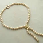 Parel collier met diamanten slot
