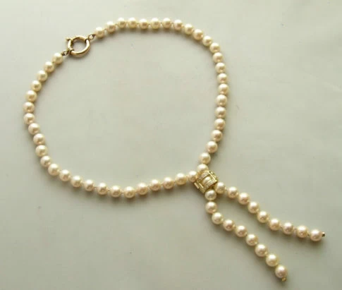 Parel collier met diamanten slot