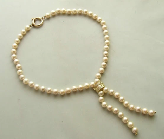 Parel collier met diamanten slot