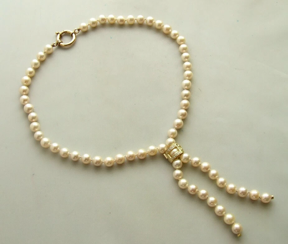 Parel collier met diamanten slot