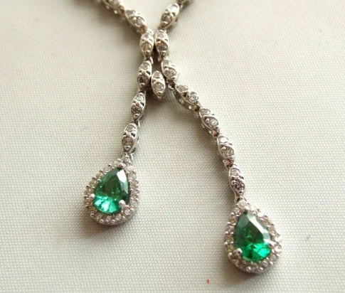 Wit gouden smaragd sieraden set