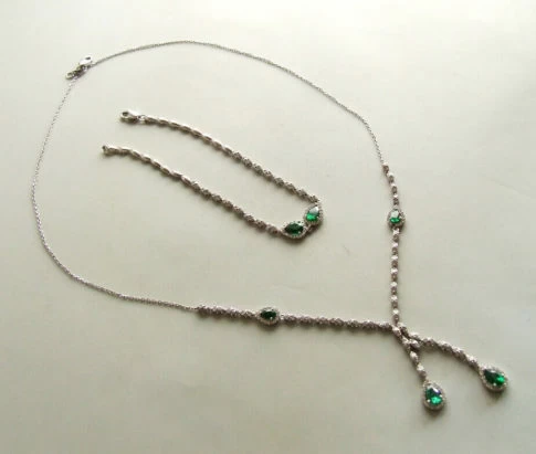 Wit gouden smaragd sieraden set