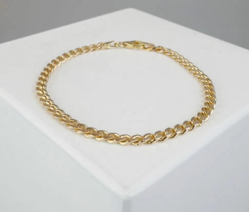 Christian massieve armband