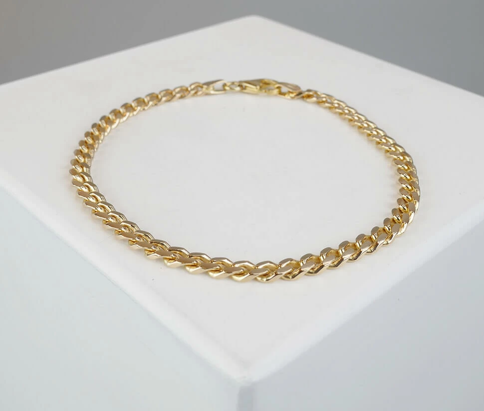 Christian massieve armband