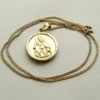 Gouden collier met Christus en Moeder Gods