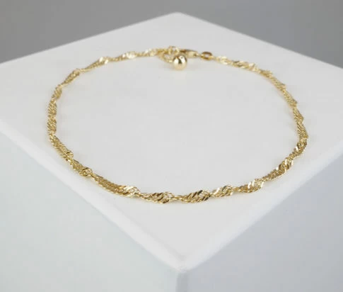 Gouden tors enkelarmband
