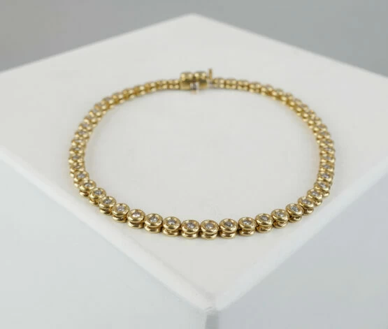 Christian gouden tennisarmband