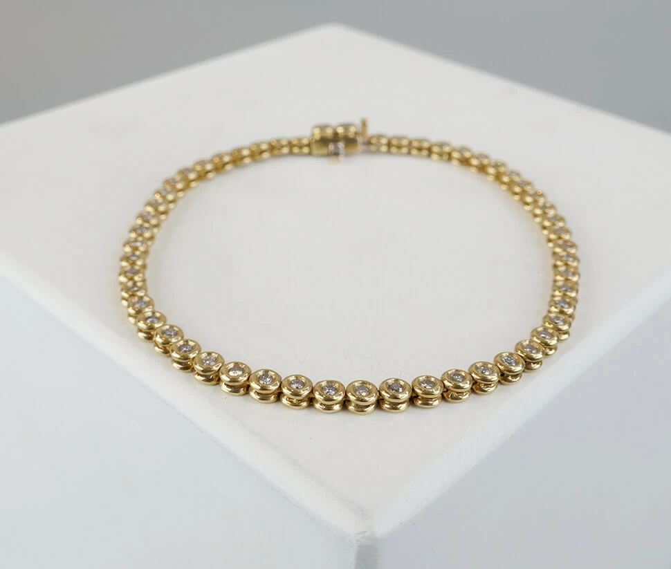Christian gouden tennisarmband