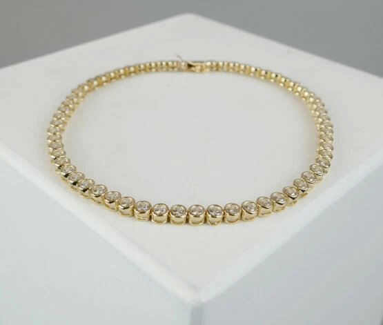 Geel gouden tennis armband met zirkonia Geel gouden tennis armband met zirkonia
