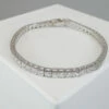 Wit gouden care tennis armband