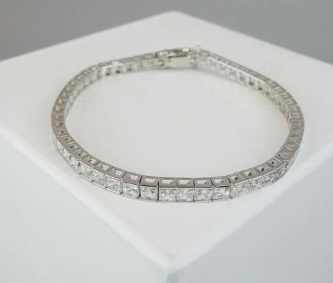 Wit gouden care tennis armband