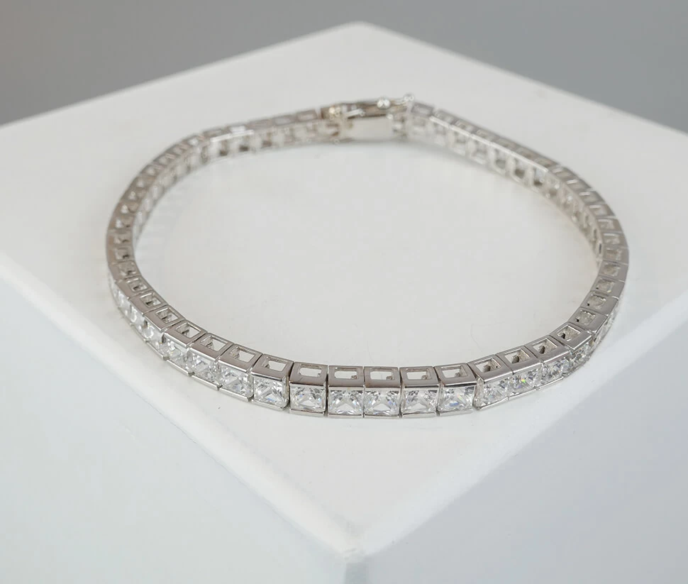 Wit gouden care tennis armband